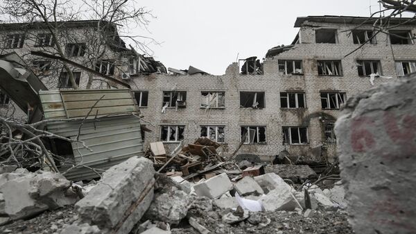 Rescaldo de um ataque de artilharia ucraniana no povoado de Vasilievka, região de Zaporozhie, 4 de janeiro de 2023 - Sputnik Brasil