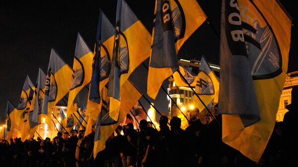 Membros do grupo extremista ucraniano Pravy Sektor durante a marcha Estou indo até você por ocasião do 72º aniversário da formação do Exército Insurgente Ucraniano, em Kiev, Ucrânia, 14 de outubro de 2014 - Sputnik Brasil
