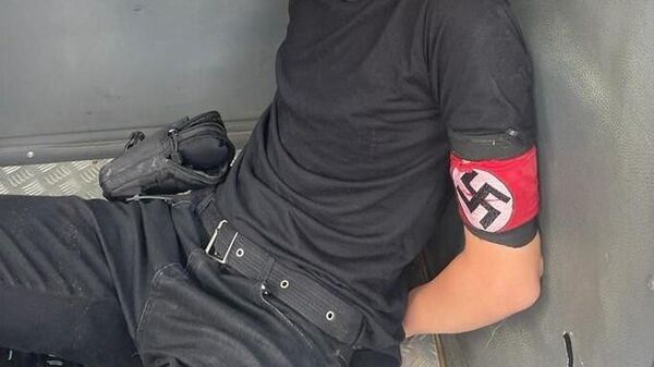 Ainda não se sabe a ligação do neonazista com a escola. Jovem foi levado sob custódia para a delegacia. Monte Mor (SP), 13 de fevereiro de 2023 - Sputnik Brasil