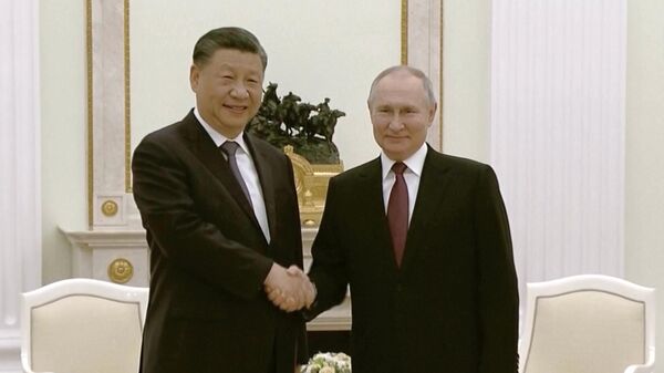Presidente russo, Vladimir Putin, no encontro com o presidente chinês, Xi Jinping, hoje (20), no Kremlin - Sputnik Brasil