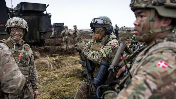 Soldados dinamarqueses  no campo de treinamento e tiro de Oksboel em Oksbol, Dinamarca, em 30 de março de 2023 - Sputnik Brasil