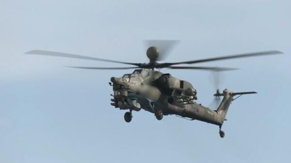 Helicóptero Mi-28 da Força Aeroespacial russa em uma missão de combate durante a operação militar especial na Ucrânia. - Sputnik Brasil