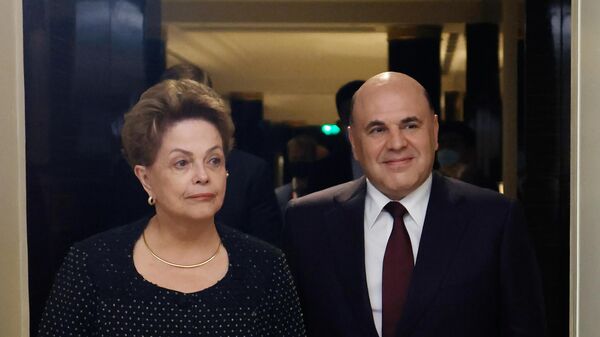 O primeiro-ministro russo Mikhail Mishustin e Dilma Rousseff, a presidente do Novo Banco de Desenvolvimento do BRICS - Sputnik Brasil