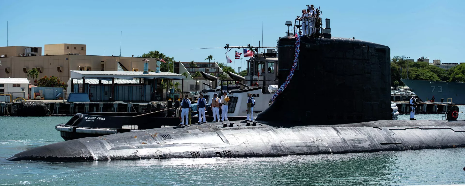 Nesta foto fornecida pela Marinha dos EUA, o submarino de ataque rápido da classe Virginia USS Illinois (SSN 786) retorna para casa na Base Conjunta Pearl Harbor-Hickam de uma implantação na área de responsabilidade da 7ª Frota em 13 de setembro de 2021 - Sputnik Brasil, 1920, 10.10.2024