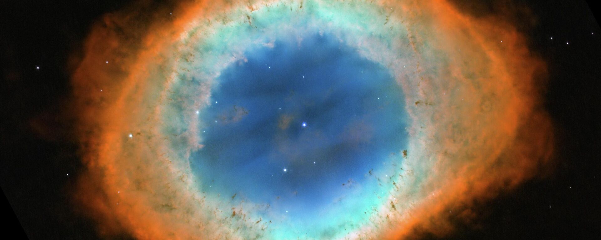 O Telescópio Espacial James Webb registrou novas imagens da conhecida Nebulosa do Anel, localizada na constelação de Lira, a aproximadamente 2.500 anos-luz da Terra - Sputnik Brasil, 1920, 17.01.2026