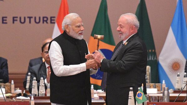 Premiê indiano Narendra Modi e o presidente brasileiro Lula da Silva na Cúpula do G20 em Nova Deli, 10 de setembro de 2023 - Sputnik Brasil