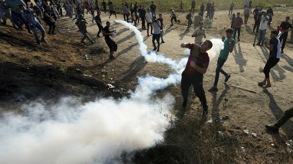 Manifestantes palestinos entram em confronto com as forças de segurança israelenses ao longo da Faixa de Gaza. Cidade de Gaza, 13 de setembro de 2023 - Sputnik Brasil