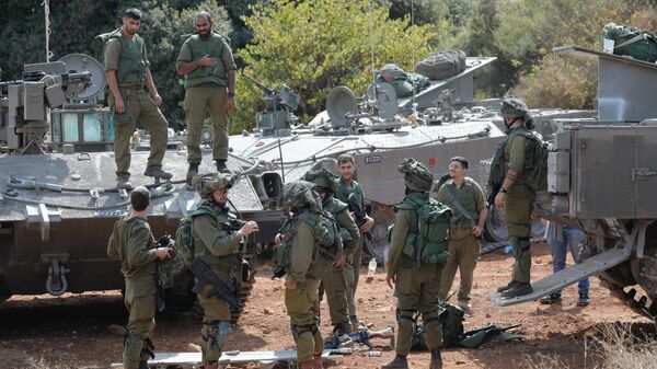 Soldados israelenses tomam posição no norte de Israel, perto da fronteira com o Líbano, 9 de outubro de 2023 - Sputnik Brasil