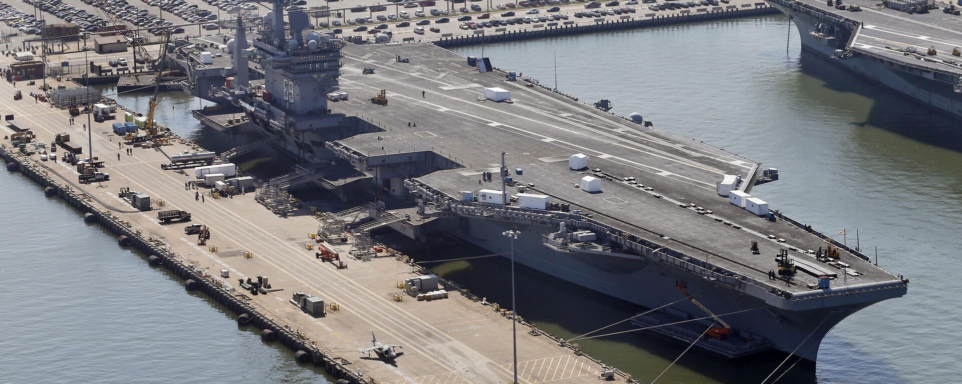 Porta-aviões de propulsão nuclear USS Dwight D. Eisenhower no cais da Estação Naval Norfolk em Norfolk, Virgínia, EUA, 27 de abril de 2016 - Sputnik Brasil, 1920, 05.11.2023