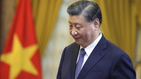 O presidente da China, Xi Jinping no Palácio Presidencial em Hanói, em 13 de dezembro de 2023 - Sputnik Brasil