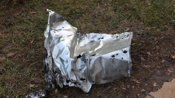Fragmento de projétil que caiu em Belgorod após bombardeio ucraniano. Rússia, 30 de dezembro de 2023 - Sputnik Brasil