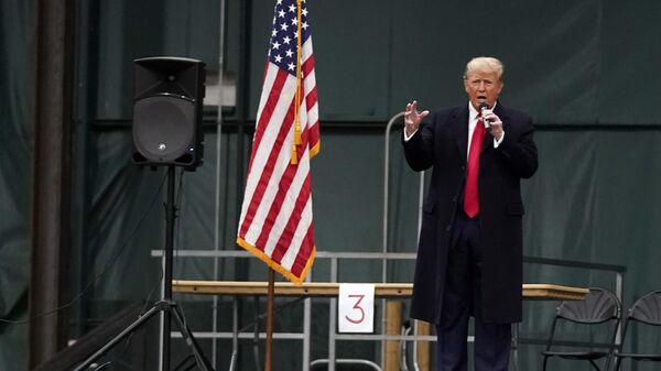 O ex-presidente republicano Donald Trump fala em caucus no Horizon Events Center, em Iowa, em 15 de janeiro de 2024 - Sputnik Brasil