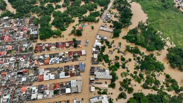 Município do Acre, estado brasileiro que divide fronteira com a Bolívia, também foi inundado. - Sputnik Brasil