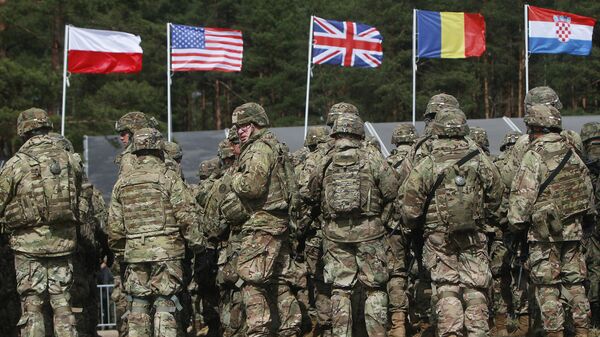 As tropas dos EUA, parte de uma missão da OTAN para melhorar a defesa da Polônia, se preparam para uma cerimônia oficial de boas-vindas em Orzysz. Polônia, 13 de abril de 2017 - Sputnik Brasil