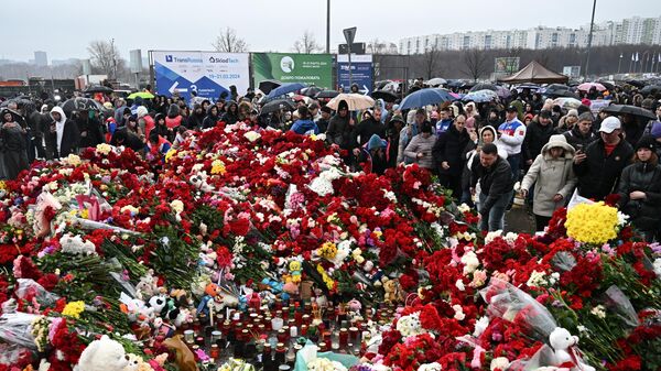 Ação em homenagem às vítimas do ataque terrorista contra o teatro Crocus City Hall, na região de Moscou, Rússia, 24 de março de 2024 - Sputnik Brasil
