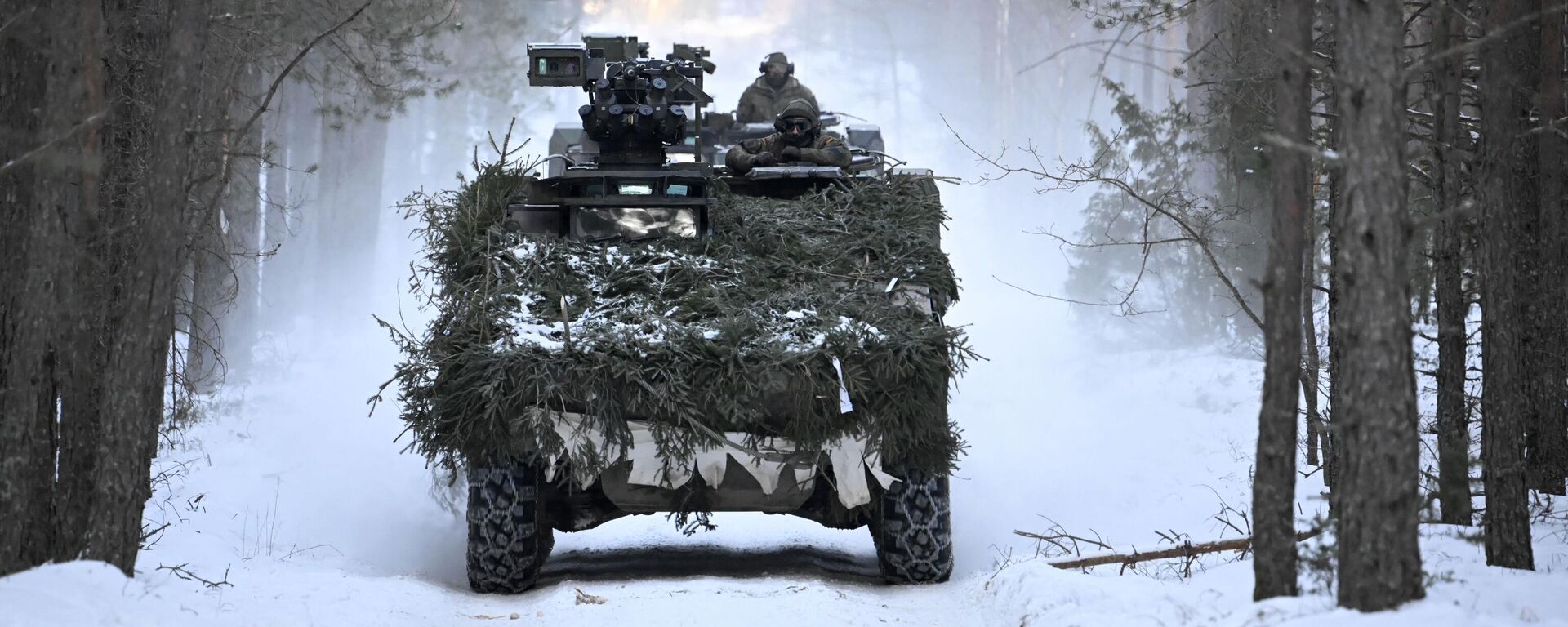 Soldados das Forças Armadas da Alemanha em veículo blindado de combate Boxer camuflado durante exercício do contingente alemão da Enhanced Forward Presence, da Organização do Tratado do Atlântico Norte (OTAN), em Pabrade. Lituânia, 7 de março de 2023 - Sputnik Brasil, 1920, 04.04.2024