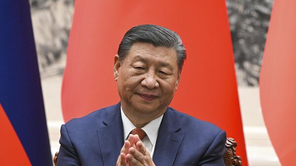 Xi Jinping, presidente chinês, durante cerimônia de assinatura com o presidente russo, Vladimir Putin, no Grande Salão do Povo, em Pequim. China, 16 de maio de 2024 - Sputnik Brasil