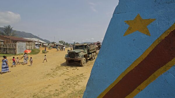 Bandeira da República Democrática do Congo pintada em muro no vilarejo de Walikale - Sputnik Brasil