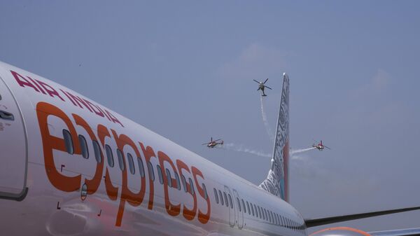 Avião da Air India Express parado em aeroporto durante evento da aviação indiana. Hyderabad, 18 de janeiro de 2024 - Sputnik Brasil