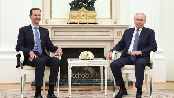 O presidente russo, Vladimir Putin, e o presidente sírio, Bashar al-Assad, participam de uma reunião no Kremlin em Moscou, Rússia, 23 de julho de 2024 - Sputnik Brasil