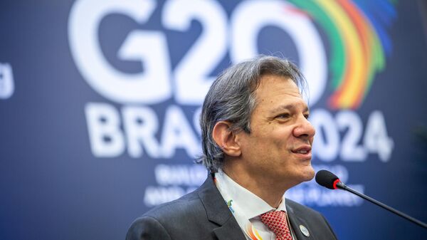 Ministro da Fazenda, Fernando Haddad, fala à imprensa durante 3º Encontro de Ministros de Finanças e Presidentes de Bancos Centrais do G20. Rio de Janeiro, 26 de julho de 2024 - Sputnik Brasil