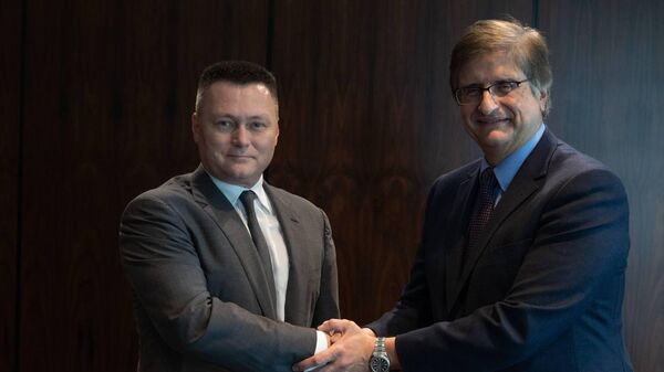 Procuradores-gerais Igor Krasnov (Rússia) e Paulo Gonet (Brasil) durante encontro bilateral à margem da cúpula de líderes de procuradorias do G20. Rio de Janeiro, 20 de outubro de 2024 - Sputnik Brasil