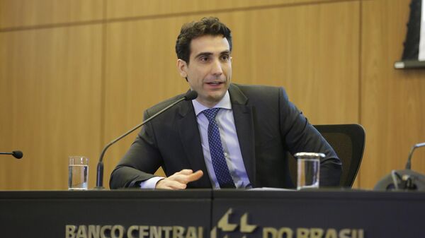 Gabriel Galípolo em reunião do Banco Central para a apresentação do relatório de inflação do 4º trimestre, em Brasília (DF). Brasil, 19 de dezembro de 2024 - Sputnik Brasil