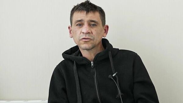 Agente dos serviços especiais ucranianos detido pelo Serviço Federal de Segurança da Rússia (FSB), Ignat Kuzin, confessa o atentado terrorista que matou o tenente-general Yaroslav Moskalik, em 26 de abril de 2025 - Sputnik Brasil