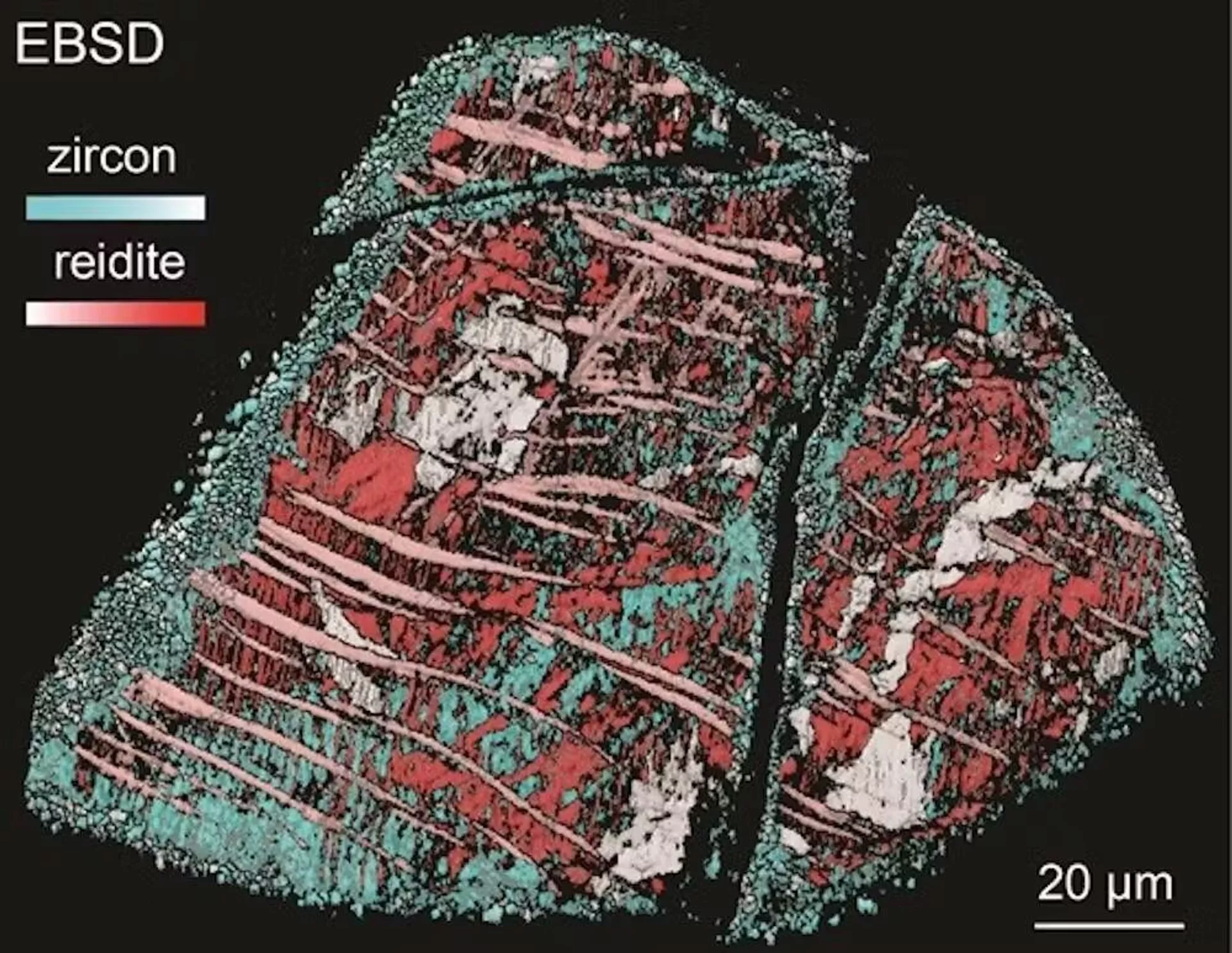Imagem de microscópio eletrônico de um zircão impactado: azul é zircão granular, vermelho é reidita formada sob pressão extrema devido ao impacto de um meteorito - Sputnik Brasil, 1920, 30.04.2025