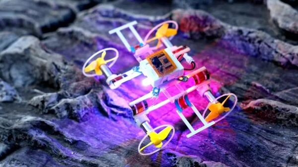 Um microrrobô terrestre-aéreo de 9 cm, sem foi, capaz de mudar de forma, desenvolvido por uma equipe de pesquisa da Universidade Tsinghua - Sputnik Brasil