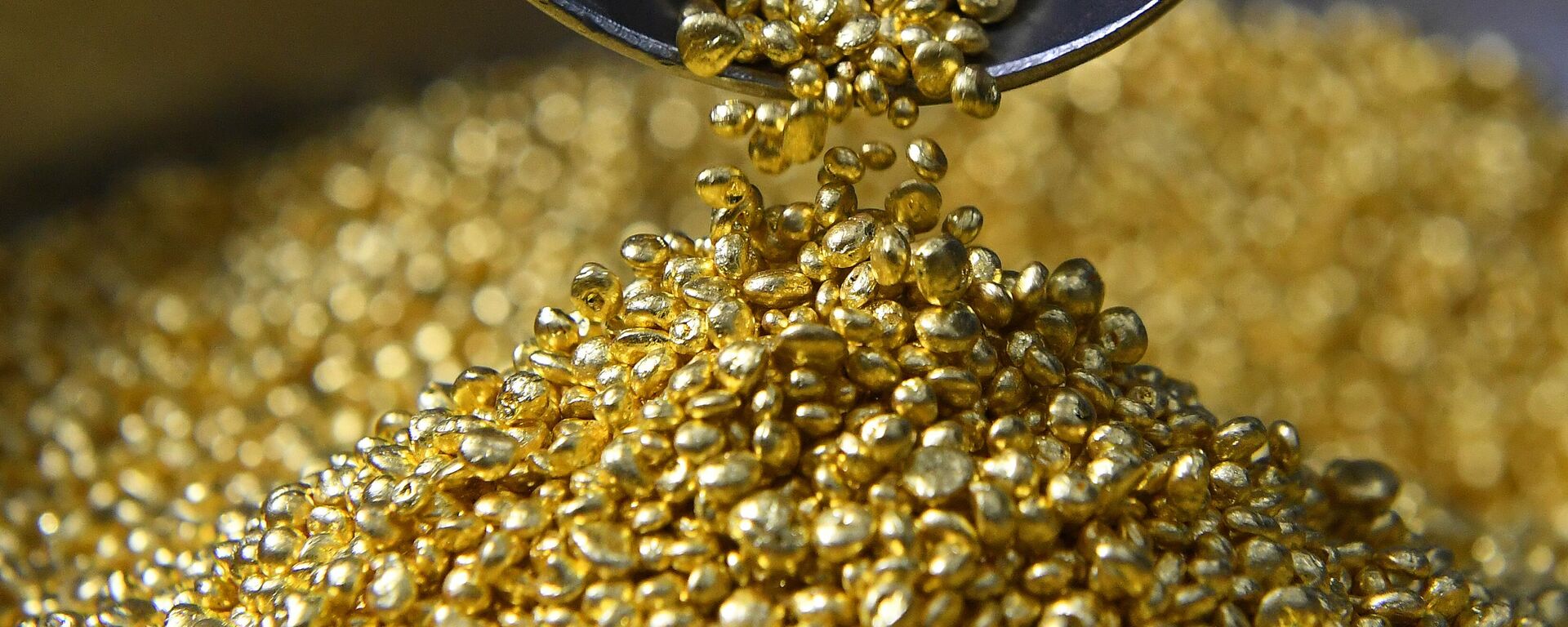 Ouro em grânulos (imagem de referência) - Sputnik Brasil, 1920, 04.03.2026