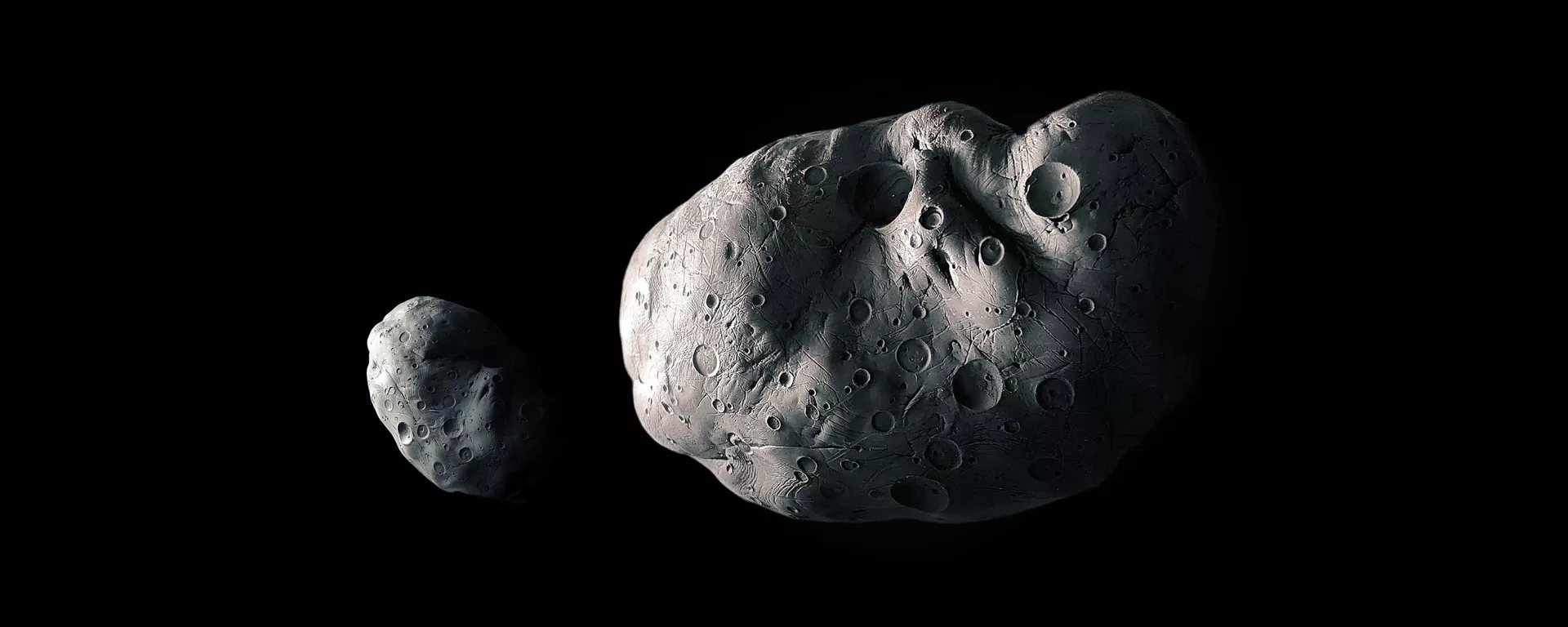 Asteroide grande e pequeno em um fundo preto, ilustração 3D de asteroides rochosos - Sputnik Brasil, 1920, 14.07.2025
