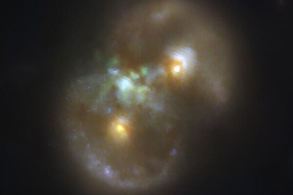 Imagem da Galáxia do Infinito vista pelo Telescópio Espacial James Webb em que astrônomos identificaram um possível buraco negro de colapso direto - Sputnik Brasil