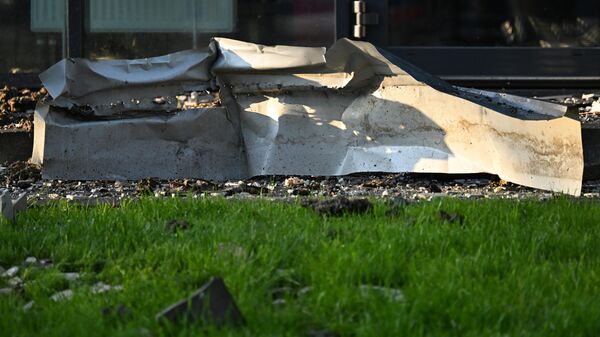 Consequências da queda de um drone em um prédio residencial na Rússia. Imagem de arquivo - Sputnik Brasil