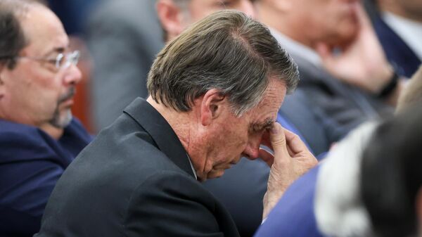 O ex-presidente Jair Bolsonaro foi condenado pela tentativa do golpe de Estado. Foto registrada no interrogatório dos réus da ação 2668, em junho de 2025 - Sputnik Brasil