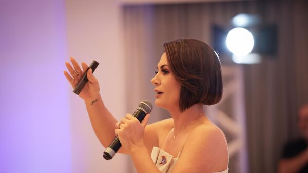 A ex-primeira-dama Michelle Bolsonaro durante evento do PL Mulher em Rio Verde (GO), em outubro de 2025 - Sputnik Brasil