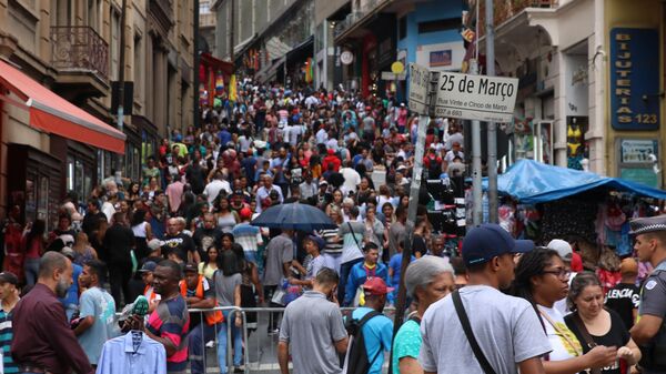 Movimento do comércio popular na 25 de Março no mês do Natal, 10 de dezembro de 2019 - Sputnik Brasil
