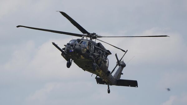 Um helicóptero Blackhawk do 160º Regimento de Aviação de Operações Especiais durante demonstração na Carolina do Norte, em junho de 2025 - Sputnik Brasil