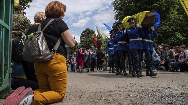 Funerário dos combatentes ucranianos eliminados pelas forças russas no front. - Sputnik Brasil