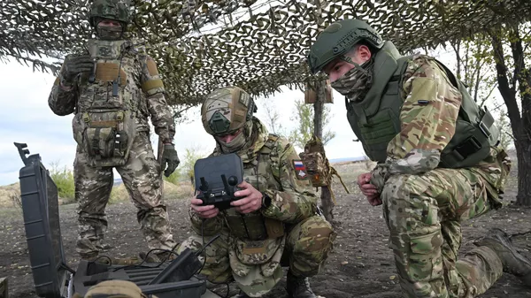 Os soldados russos na zona da operação militar especial na Ucrânia. - Sputnik Brasil