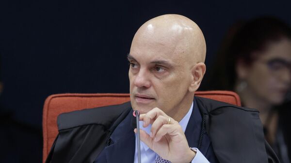 O ministro Alexandre de Moraes durante julgamento do núcleo 2 da ação penal que investiga atos antidemocráticos, em dezembro de 2025 - Sputnik Brasil