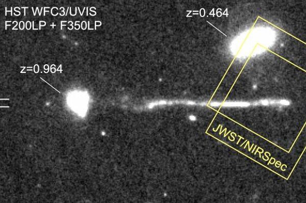 Uma imagem do Hubble de um buraco negro supermassivo descontrolado, agora confirmado, com o rastro investigado pelo JWST - Sputnik Brasil