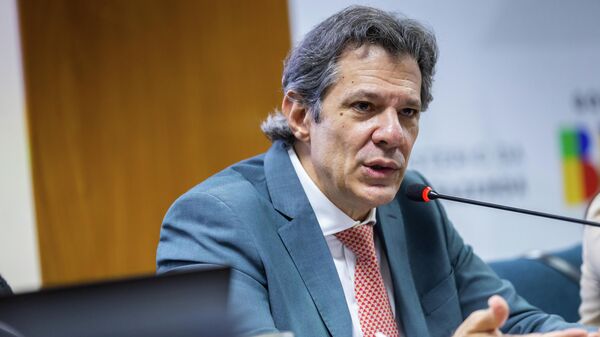 O ministro da Fazenda, Fernando Haddad, durante evento com jornalistas - Sputnik Brasil