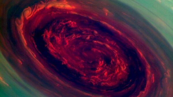 O olho da tempestade no polo norte de Saturno em cores falsas - Sputnik Brasil