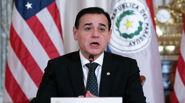 O ministro das Relações Exteriores do Paraguai, Rubén Ramírez Lezcano, acompanhado pelo secretário de Estado Marco Rubio, discursa durante a cerimônia de assinatura do Acordo sobre o Estatuto das Forças entre os Estados Unidos e o Paraguai, no Departamento de Estado, em Washington, 15 de dezembro de 2025 - Sputnik Brasil