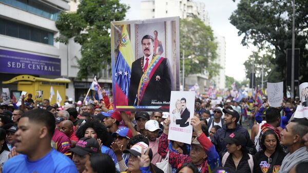 Venezuelanos protestam contra o sequestro de Nicolás Maduro e Cilia Flores, em janeiro de 2026 - Sputnik Brasil