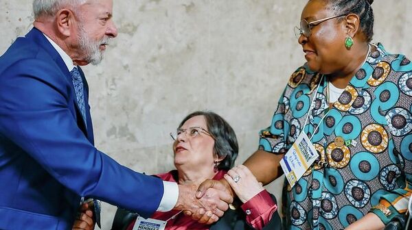 Presidente da Republica Luiz Inacio Lula da Silva durante Seminário - Brasil pela Vida das Meninas e Mulheres, com ativistas Maria da Penha e Regina Célia, 4 de março de 2025. - Sputnik Brasil