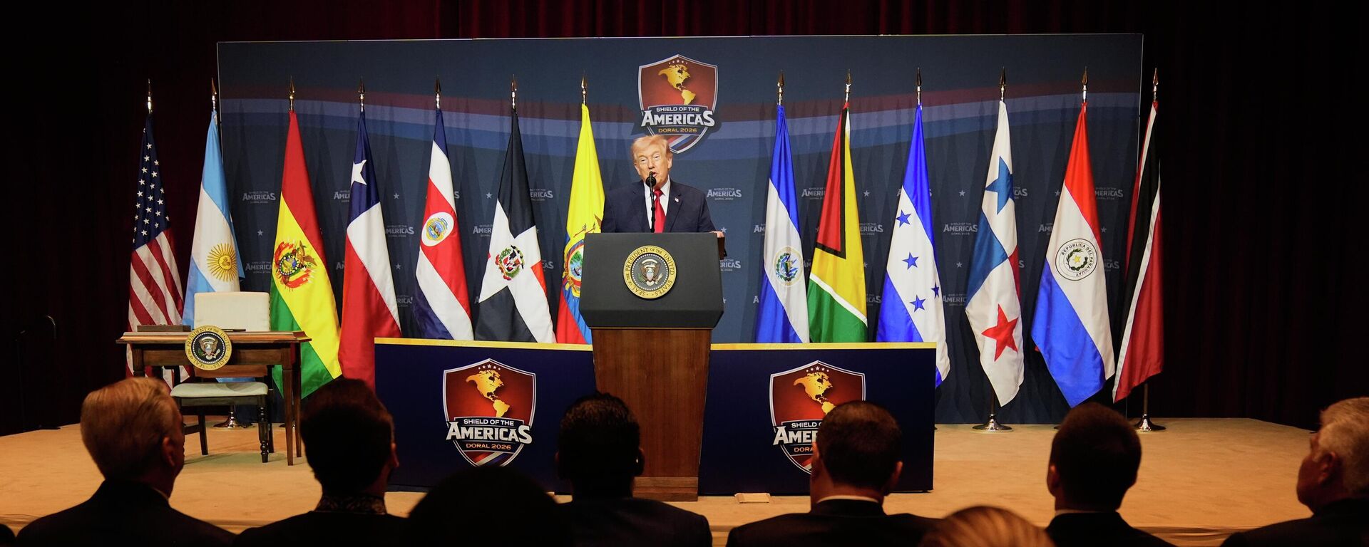 Donald Trump, presidente dos Estados Unidos,  em evento sobre o Escudo das Américas - Sputnik Brasil, 1920, 19.03.2026
