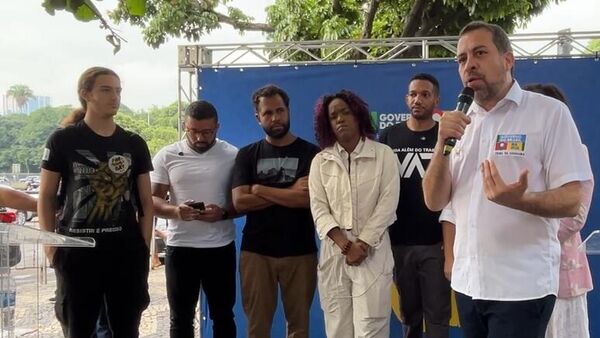 Guilherme Boulos, ministro da Secretaria-Geral da Presidência, fala sobre o fim da escala 6 x 1 na inicativa Debate na Rua, no Rio de Janeiro (RJ). Brasil, 20 de março de 2026 - Sputnik Brasil