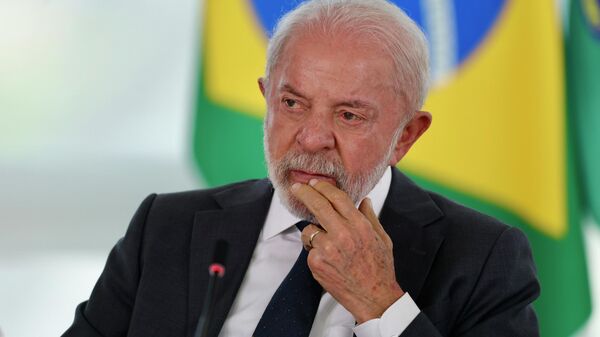 O presidente da República, Luiz Inácio Lula da Silva, sanciona projetos de lei que fortalecem combate à violência contra a mulher, Brasília, 9 de abril de 2026 - Sputnik Brasil